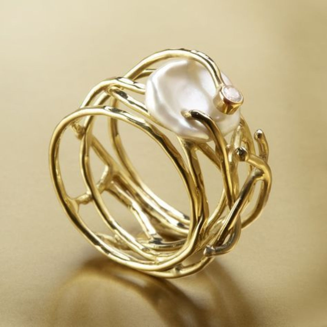 Classic Gold Ring Adorned with Delicate Pearl