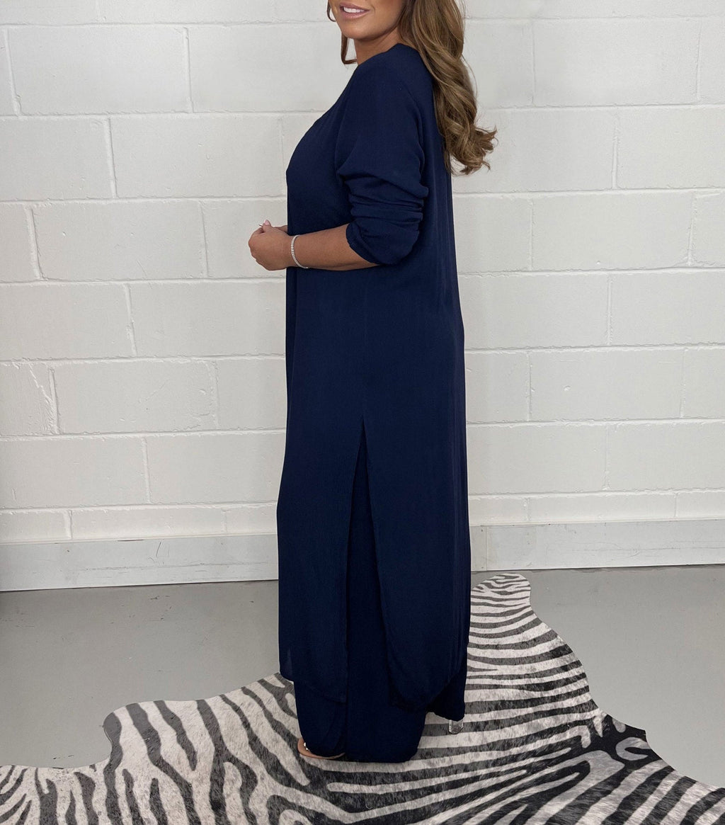 Global Elegance: V-Neck Split Luxe Blouse & Tailored Trousers