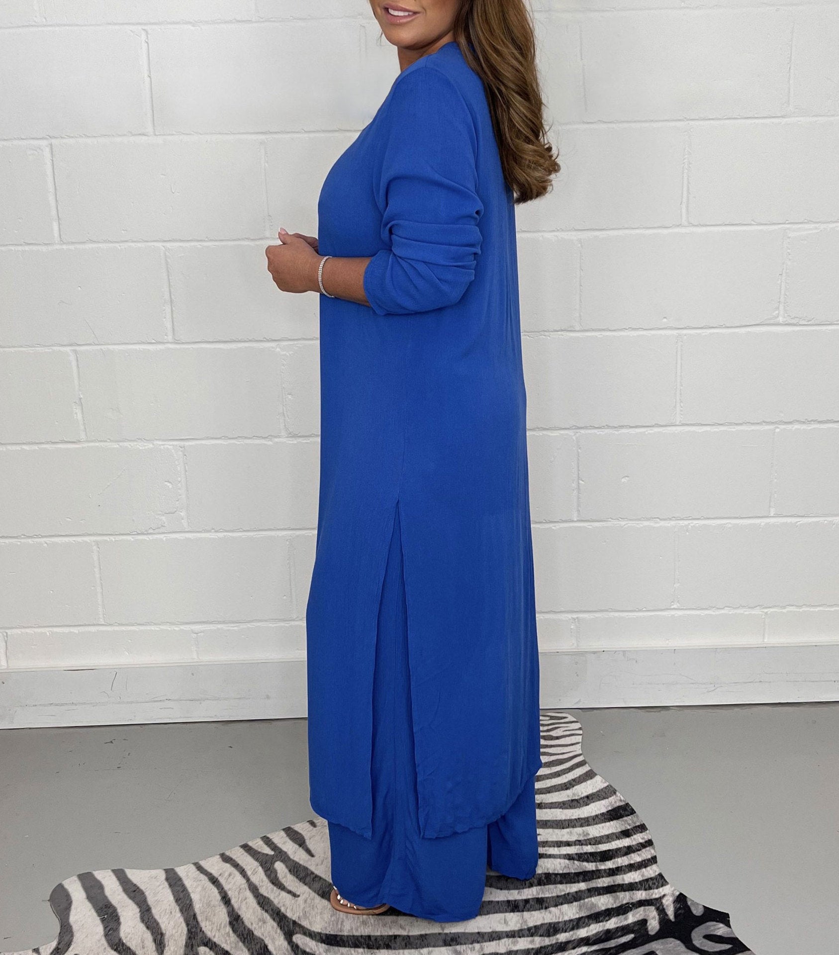 Global Elegance: V-Neck Split Luxe Blouse & Tailored Trousers
