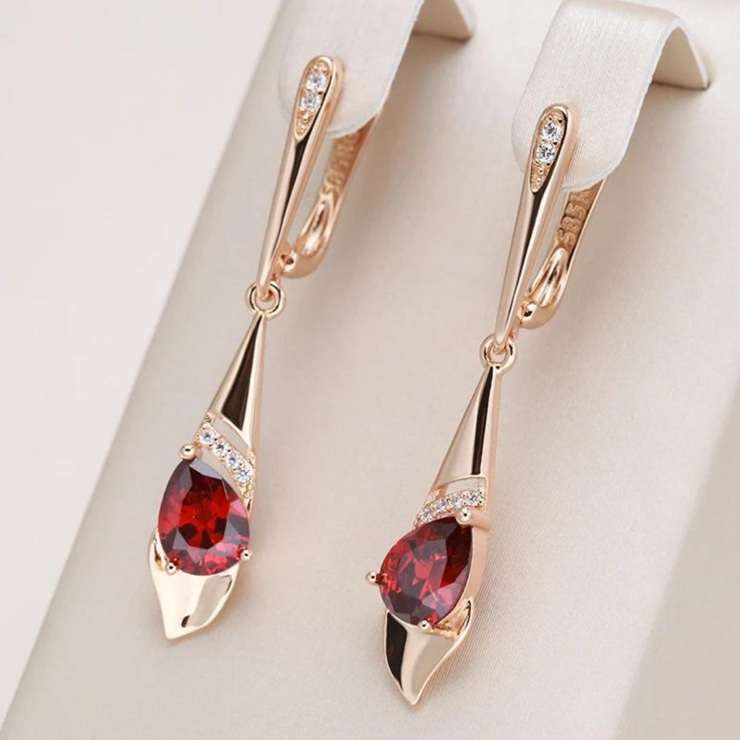 Gold Pendant Featuring a Stunning Red Crystal